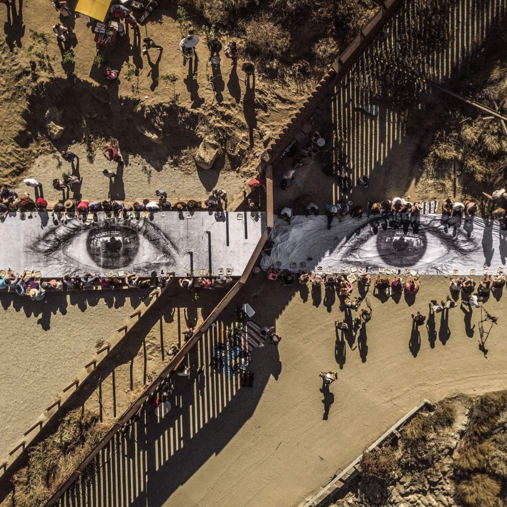 JR: Migrants, Mayra, Picnic across the Border, Tecate, Mexico—U.S.A (2017)