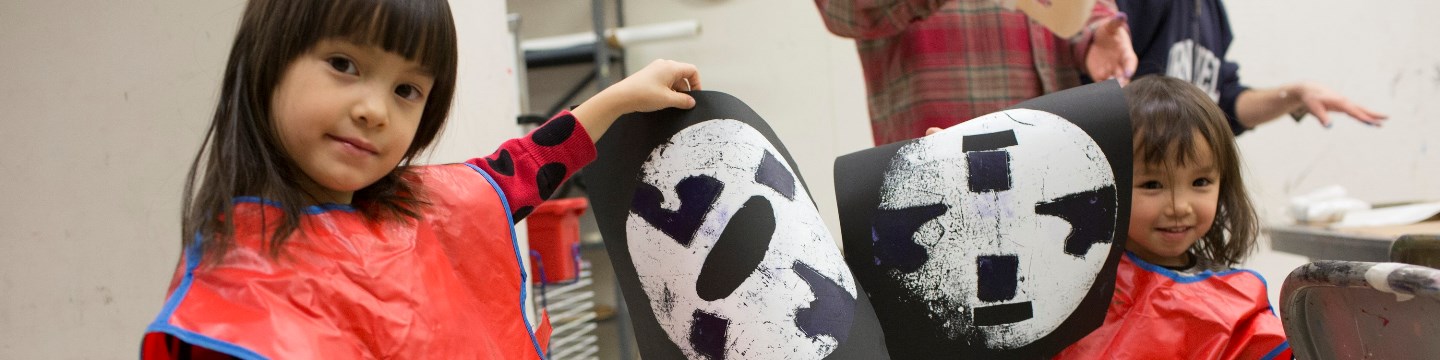 Two young girls making art at the Brooklyn Museum